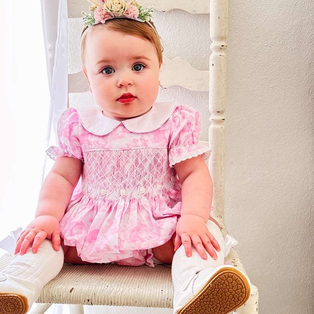 Smocked Easter bubble romper with bunny toile and bow tie on back